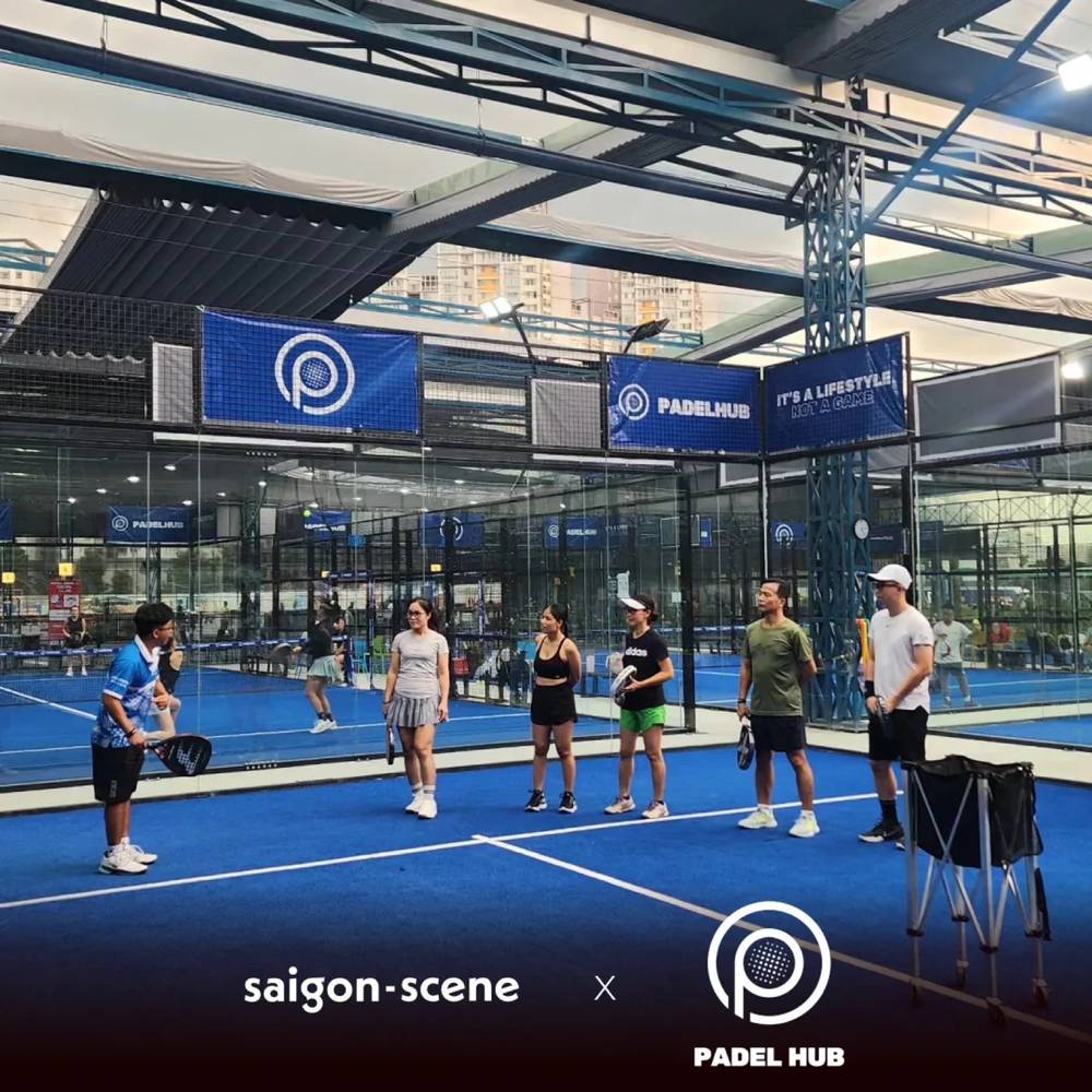 Padel players on court at PadelHub